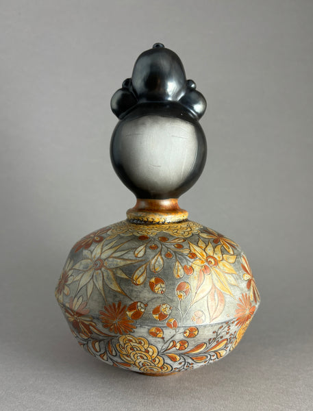 Kokeshi forme hexagonale courbe au chignon foncé métallisé